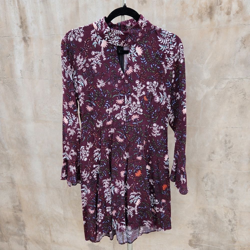 Two arrows dark floral keyhole bell sleeve dress
